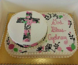 cake with cross design and god bless message