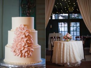 elegant wedding cake with creme pink blossom on one side